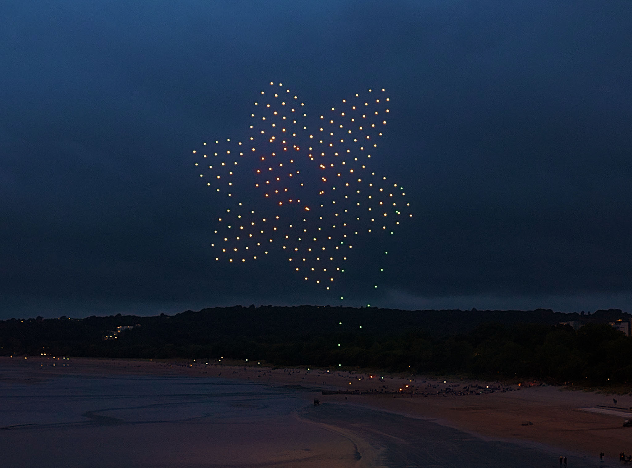 225 drones create a 300ft Dafodil to celebrate Welsh pride